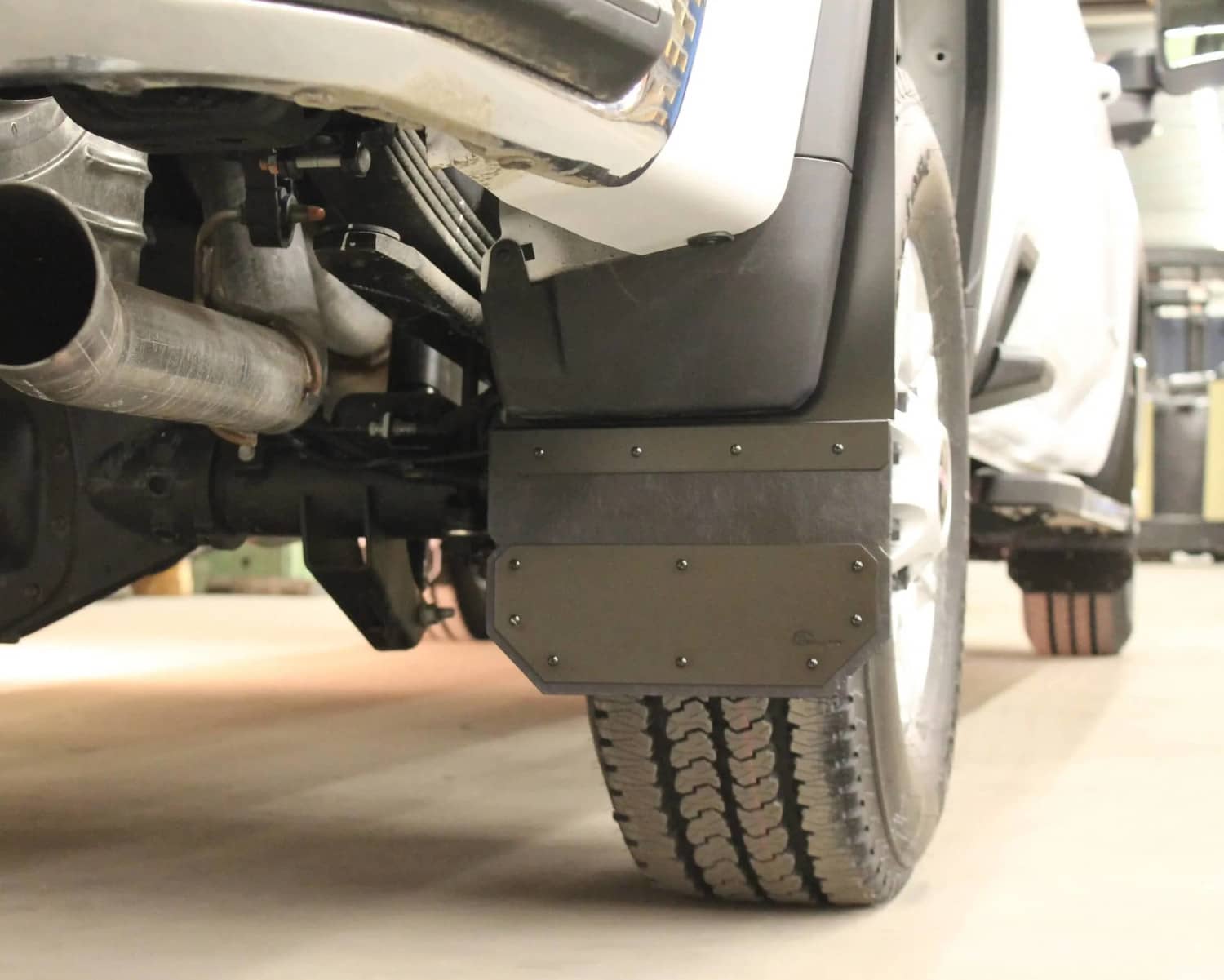 BLACK REAR MUD FLAPS 20-26 CHEV HD– Canada Hitch Rack